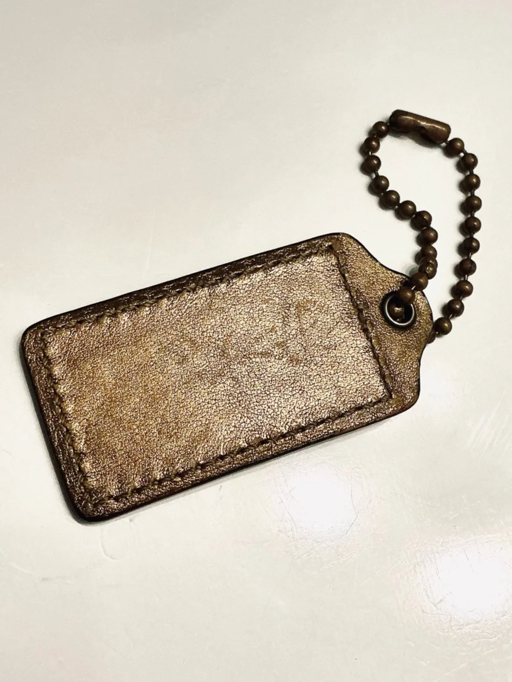 COACH Metallic Bronze, Gold Finish Replacement Hang Tag Bag Charm Fob